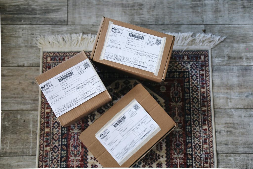 Delivery boxes over a carpet on the floor