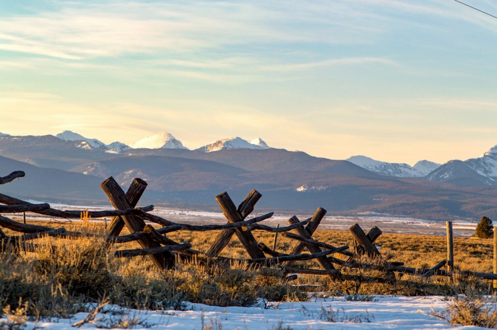 Montana mountain range with wooden fence