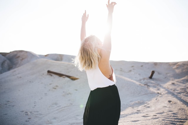 Woman with her arms in the air